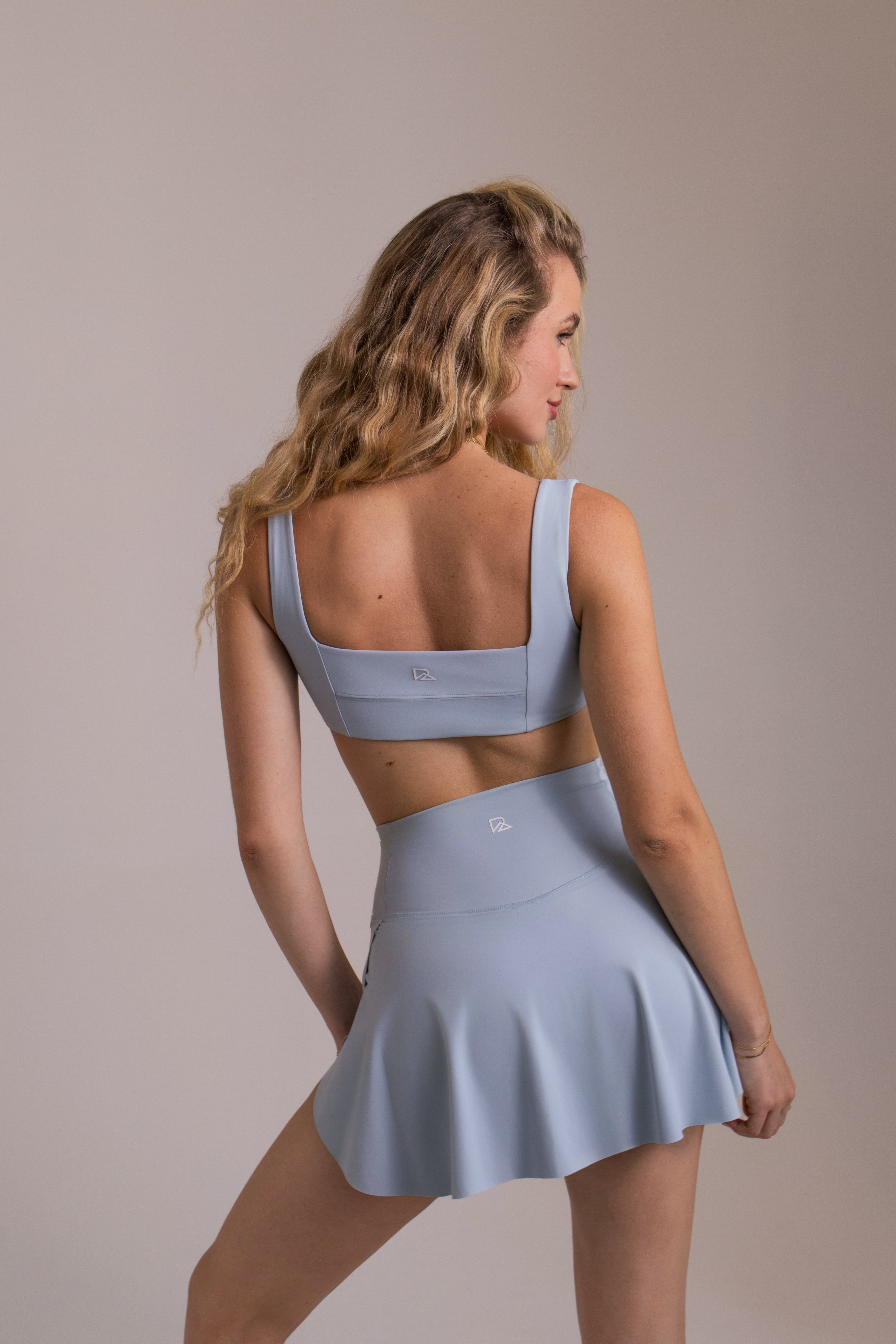 Women's Athletic Skort with Built-In Shorts & Pockets - Baby Blue | LuxeForm Criss-Cross Waist.